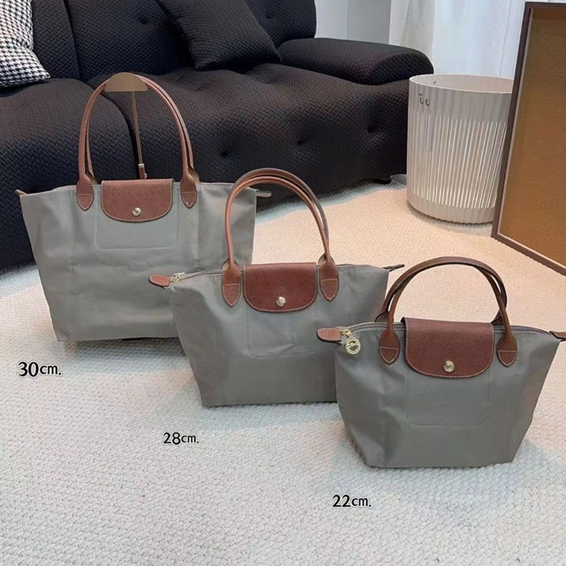 War Horse Tay cầm bằng da nữ mới Túi xách đeo vai đơn Túi du lịch Nylon chống thấm nước