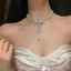 Vòng cổ ngọc trai nơ CZ zircon và tua rua mạ bạc - Trang sức buổi tối sang trọng dành cho nữ