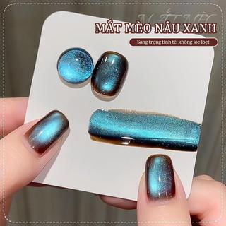 Phong cách mới Thu/Đông Sơn móng tay dạng gel mắt mèo màu nâu và xanh 2026 Mắt mèo hạt thủy tinh hai tông màu sang trọng rực rỡ và trong suốt