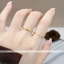 Nhẫn titan không gỉ mạ vàng 24k thiết kế họa tiết đơn giản thanh lịch dành cho nữ