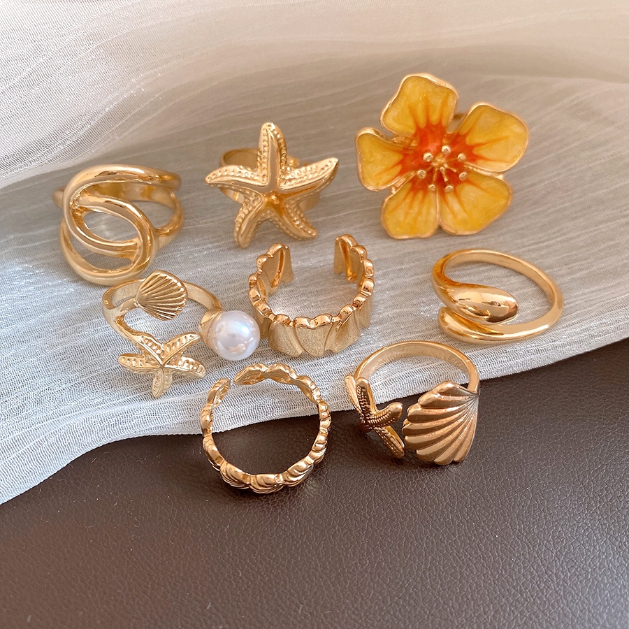 Bộ nhẫn vàng theo chủ đề đại dương kèm hoa tráng men, sao biển, vỏ sò & ngọc trai chi tiết dành cho nữ Phong cách bãi biển mùa hè