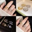 Nhẫn mở hình ngôi sao Zircon màu bạc tông màu vàng, thiết kế hai ngôi sao có thể điều chỉnh, trang sức tuyên bố tinh tế dành cho nữ