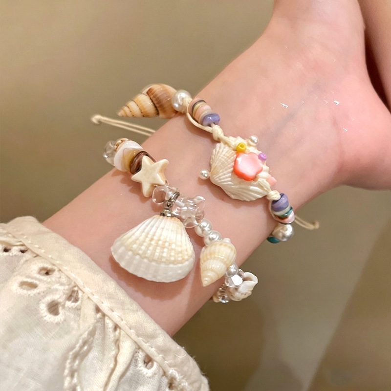 Vòng tay ốc xà cừ, gốm ngọc trai và đá tự nhiên - Phong cách thời trang, tinh tế