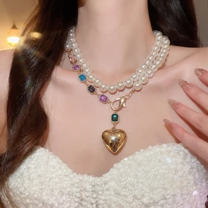 Vòng cổ ngọc trai giả tông màu vàng có thể điều chỉnh với mặt dây chuyền giọng & trái tim bằng kim cương giả CZ đầy màu sắc, trang sức có thể xếp lớp thanh lịch cổ điển dành cho nữ