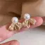 Vintage Phong Cách Pháp Rỗng Filigree Lưới Nơ Bông Tai Màu Vàng Vỏ sò Cạnh Mini Trang Trí Kim Cương Giả Tròn Mịn Ngọc Trai Bông Tai Thanh Lịch Hẹn Hò Văn Phòng Nhẹ Nhàng Phù Hợp Với Trang Sức