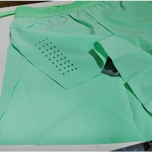 Quần Short Chạy Bộ Liền Mạch Nam Nữ Cùng Phong Cách Thể Thao Marathon Rời Nhanh Khô Ba Điểm