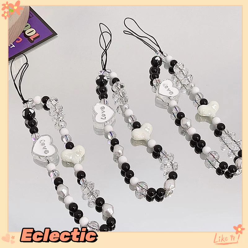 – Eclectic – Dây đeo điện thoại di động mèo hình trái tim đính hạt màu đen và trắng màu hồng để chống mất mát