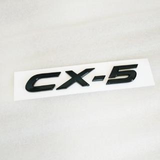 2013-2019 Mazda CX5 logo lưới tản nhiệt phía trước logo cốp xe logo ánh sáng màu đen sợi carbon logo xe Huy hiệu