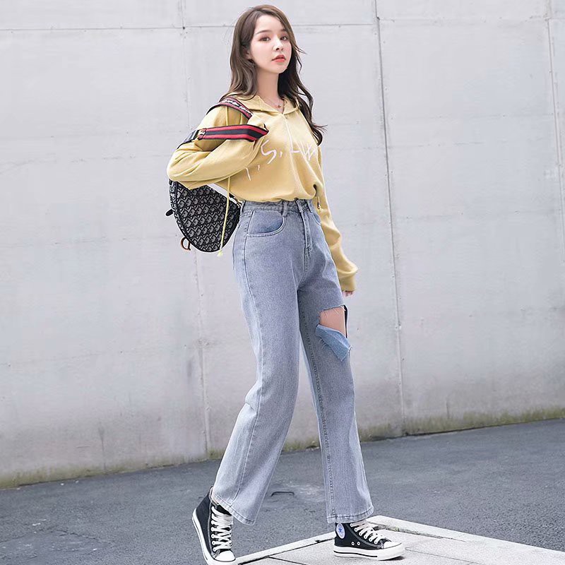 Ảnh Quần jean nữ lưng cao ống rộng dáng suông dạng rách gối cá tính 3