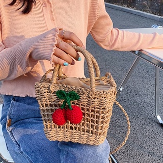 Túi cói mini đeo chéo gắn quả đỏ - đan lưới ô vuông thưa
