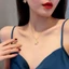 Dây chuyền nữ chất liệu titan thiết kế mặt cỏ 4 lá xoay chuyển độc đáo thời trang mẫu mới 2023