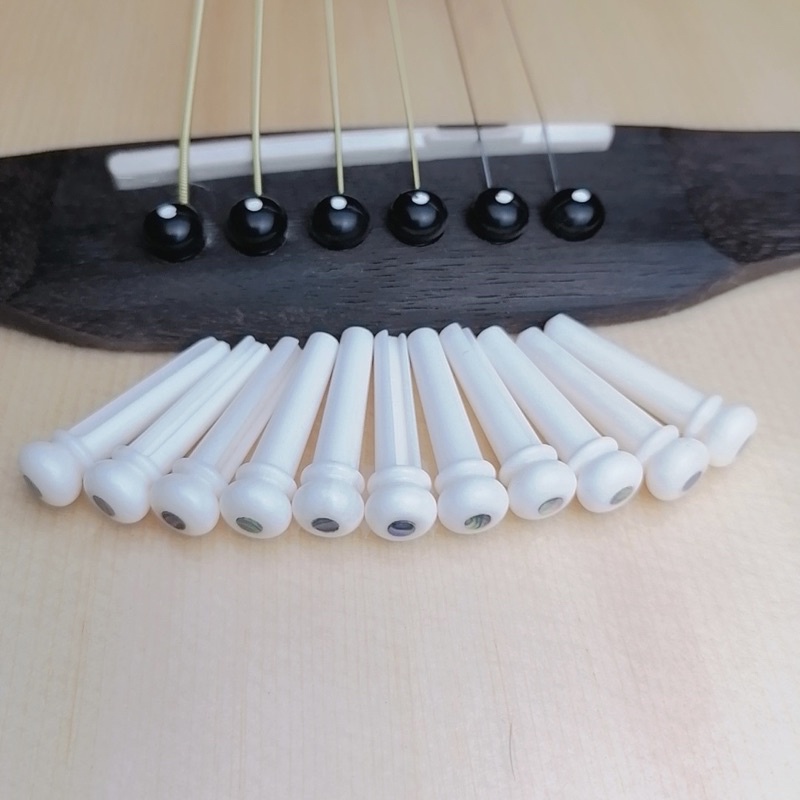 Chốt ghim dây đàn guitar acoustic, chốt giữ dây đàn guitar, tặng kèm phím  gảy đàn guitar | Shopee Việt Nam