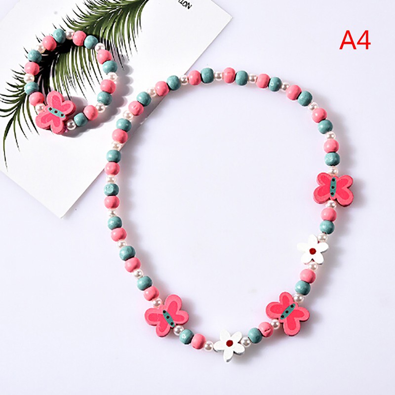 Vòng tay và dây chuyền chuỗi hạt gỗ hoạt hình cho bé gái