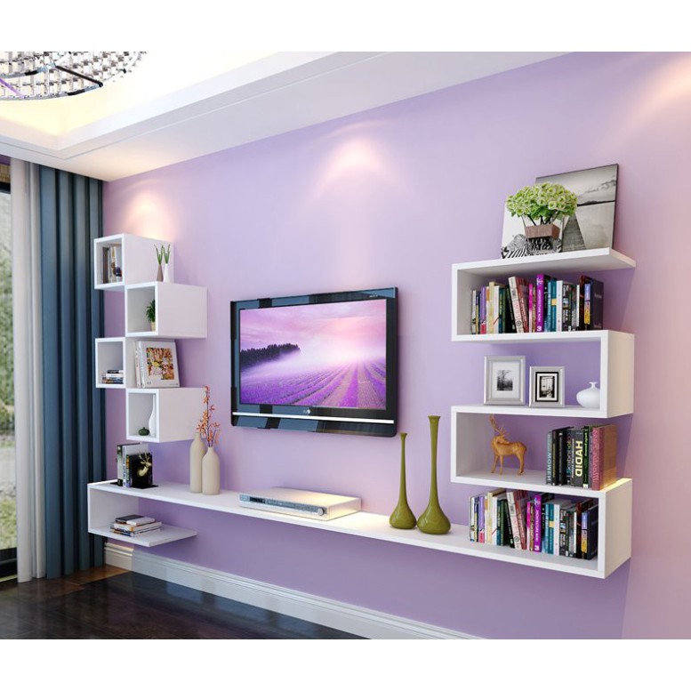 Kệ Tivi treo tường: Hãy tưởng tượng một không gian phòng khách tối giản và hiện đại với tivi treo tường, tạo ra sự sang trọng và tiết kiệm diện tích mà không ảnh hưởng đến trải nghiệm xem TV của bạn. Hãy xem hình ảnh để chiêm ngưỡng kệ Tivi treo tường tuyệt đẹp được thiết kế bởi những chuyên gia hàng đầu.