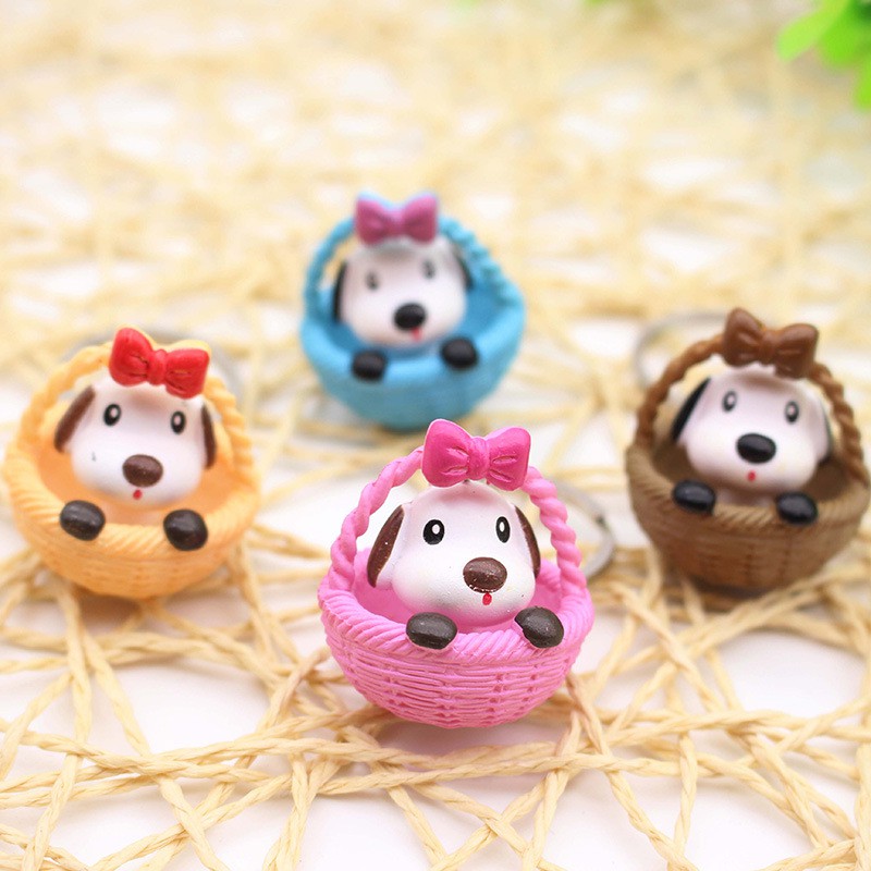 Móc khóa cún ngồi giỏ