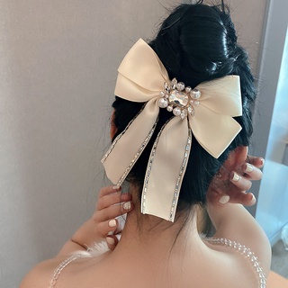 Kẹp Tóc Nơ Đính Đá Và Ngọc Trai Giả Xinh Xắn Cho Nữ