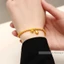 Vòng tay titan nữ không gỉ thiết kế hình bông sen đài sen phong cách cổ điển thanh lịch mẫu mới