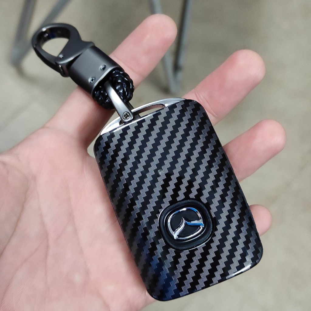 Ốp chìa khóa ô tô nhựa vân carbon, Chất liệu nhựa abs. Có nhiều dòng xe