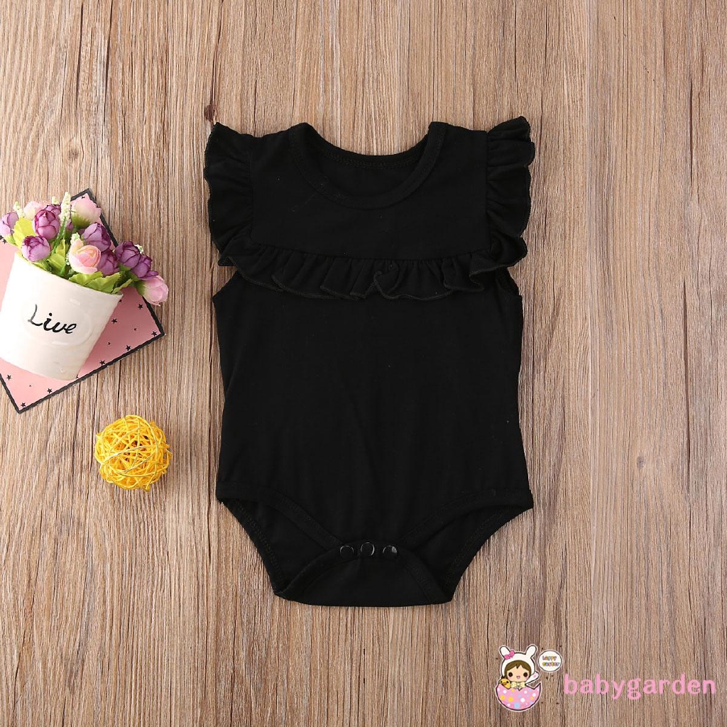 Áo liền quần cổ bèo nhún cho bé gái