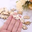 Set 50 miếng gỗ khắc hình vỏ sò/ sinh vật biển dùng trang trí tiệc cưới