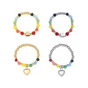 Nhẫn nữ titan kiểu xâu chuỗi bi tròn và thủy tinh màu sắc charm mặt cười trái tim xinh xắn không gỉ WE2209