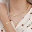Lắc tay titan không gỉ mạ vàng 18k thiết kế xoắn chéo thời trang dành cho nữ