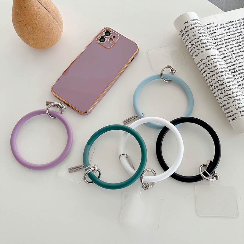 Dây Đeo Điện Thoại Bằng Silicone Hình Tròn Có Vòng Nhẫn Đeo Tay Chống Thất Lạc