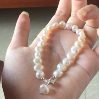 Ảnh Vòng Tay Ngọc Trai Hạt Dẹt 7ly Trắng Khóa Bạc - Ngọc Trai Trường Thịnh 2