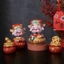 Mô hình ông thần tài ngồi hũ tiền trang trí nhà cửa, bàn làm việc, bàn học, tủ sách, taplo ô tô, quà tặng