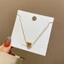 Dây chuyền trái tim chất liệu titan không gỉ mạ vàng 18k thiết kế trẻ trung xinh xắn dành cho nữ