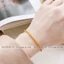 Lắc tay nữ bằng chất liệu titan không gỉ mạ vàng 24k thiết kế kiểu bện vải thời trang sang trọng