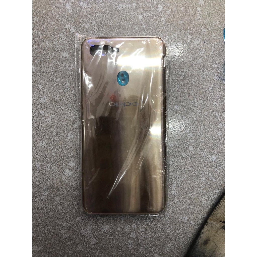 vỏ/lưng oppo a7 màu vàng