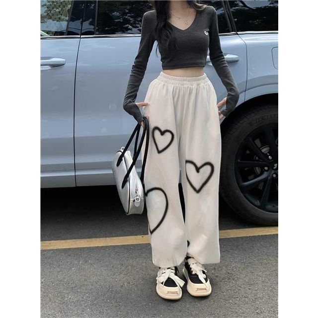 Milyfashion Quần ống rộng in họa tiết trái tim, phong cách ngọt ngào năng động, quần thể thao nữ màu trắng