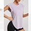 Áo Tank Top Thể Thao Xẻ Tà Bên Hông Màu Nude Dài Thể Thao Hàng Ngày Cho Nữ