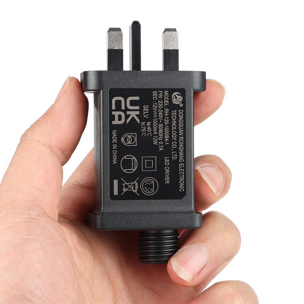 Bộ chuyển đổi nguồn UMITY Đa năng Ngày lễ Dây chiếu sáng Thiết bị bơm hơi AC 110V sang DC 12V 1A