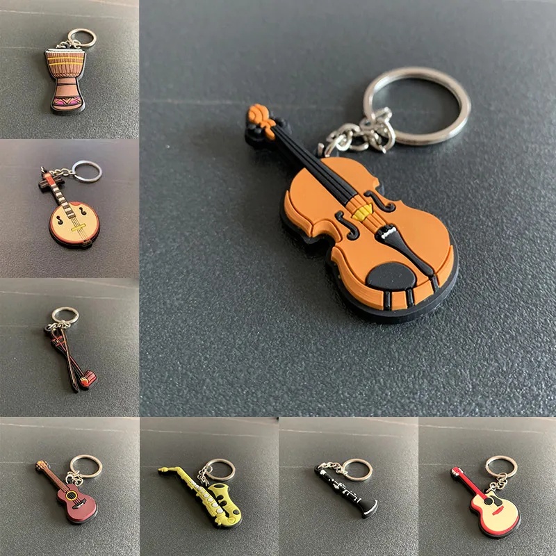 Sáng tạo cổ điển guitar keychain thời trang nhạc cụ silicone đồ trang ...