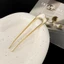 Simple Hair Fork Cùng kim loại Hair Trâm Vỏ Giấy Chải Tóc In Lưới Đỏ Cùng U Hợp Kim Hair Fork Sắt