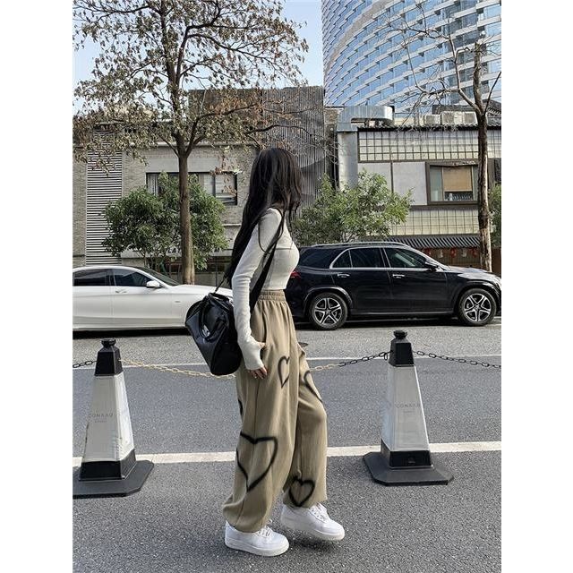 Milyfashion Quần ống rộng in họa tiết trái tim, phong cách ngọt ngào năng động, quần thể thao nữ màu trắng