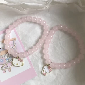 Vòng tay mèo con màu hồng dễ thương mới ins girl heart pure desire kt bracelet bạn gái chị em headpiece