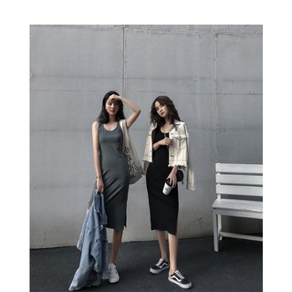 Váy lửng dài trung bình dành cho phụ nữ với kiểu dáng xẻ tà và vẻ ngoài giảm béo, kết hợp với váy dưới cùng