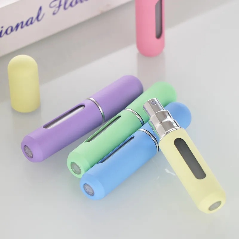 Loại máy ép có thể nạp lại 5ml chai nước hoa làm đầy trực tiếp dưới đáy / hộp đựng mẫu di động đi du lịch và đi ra ngoài / chai xịt tinh dầu nhỏ màu