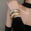Vòng tay có thể điều chỉnh mặt rộng không đều Châu Âu và Hoa Kỳ Vòng tay phóng đại thời trang gió lạnh cá tính trang sức tay người phụ nữ