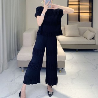 Quần áo Miyake xếp ly màu trơn ngắn tay, phù hợp với nữ cao cấp mùa hè