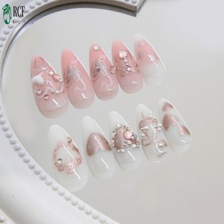 Móng tay giả màu trắng hồng có nơ in hình nhẹ và dễ dính móng tay giả