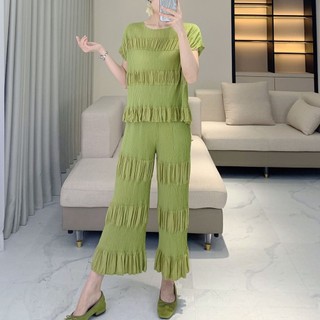 Quần áo Miyake xếp ly màu trơn ngắn tay, phù hợp với nữ cao cấp mùa hè