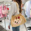 Túi đựng bánh bao đồng thương hiệu Gentlewoman Monchhichi thiết kế Niche Túi đeo vai dây rút