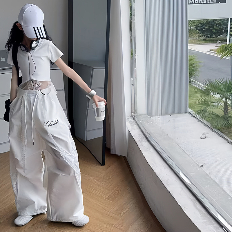 Bộ Đồ Thời Trang Bé Gái Mùa Hè 2025 Phong Cách Mới Trẻ Em Mỏng Phong Cách Ren Không Đều Khâu Áo Thun Tay Ngắn + Quần Ống Rộng Bộ Đồ Hai Mảnh
