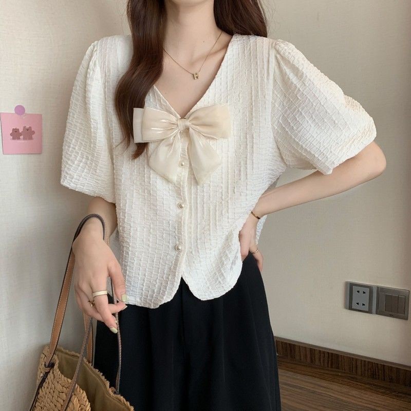 Áo sơ mi cổ chữ V dành cho nữ mùa hè 2025 phong cách mới thời trang Pháp giản dị nơ ngắn tay áo voan dành cho nữ
