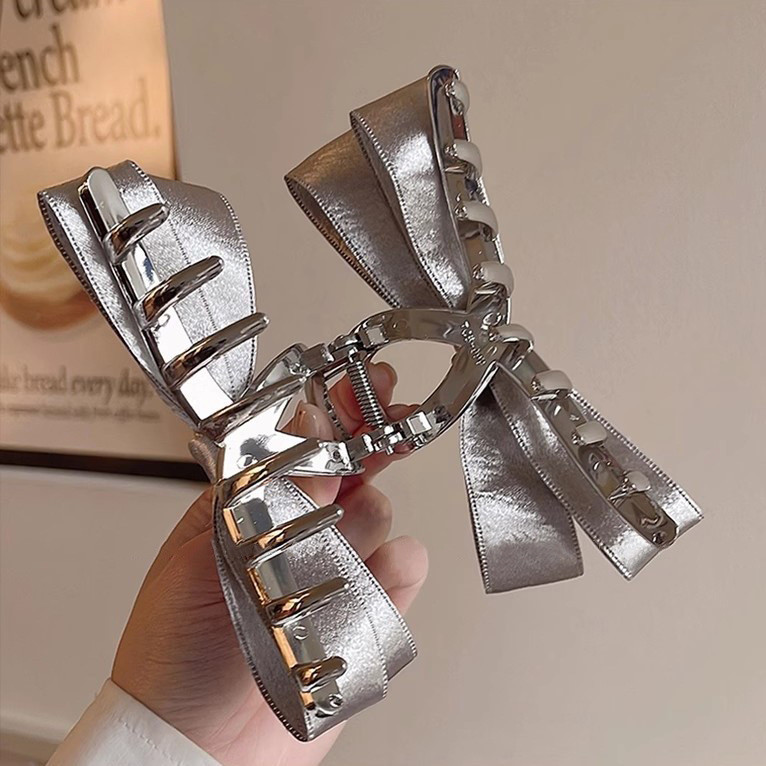 Kẹp cá mập nơ bạc nữ cho tóc dày