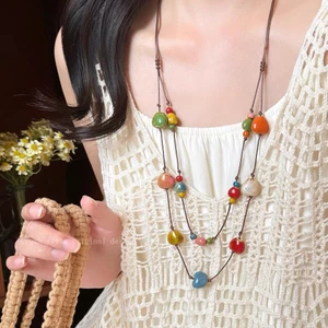 Mới Trung Quốc Tình Yêu Gốm Đôi Lớp Vòng Cổ Nữ Vintage Trái Tim Mặt Dây Chuyền Vòng Cổ Dài